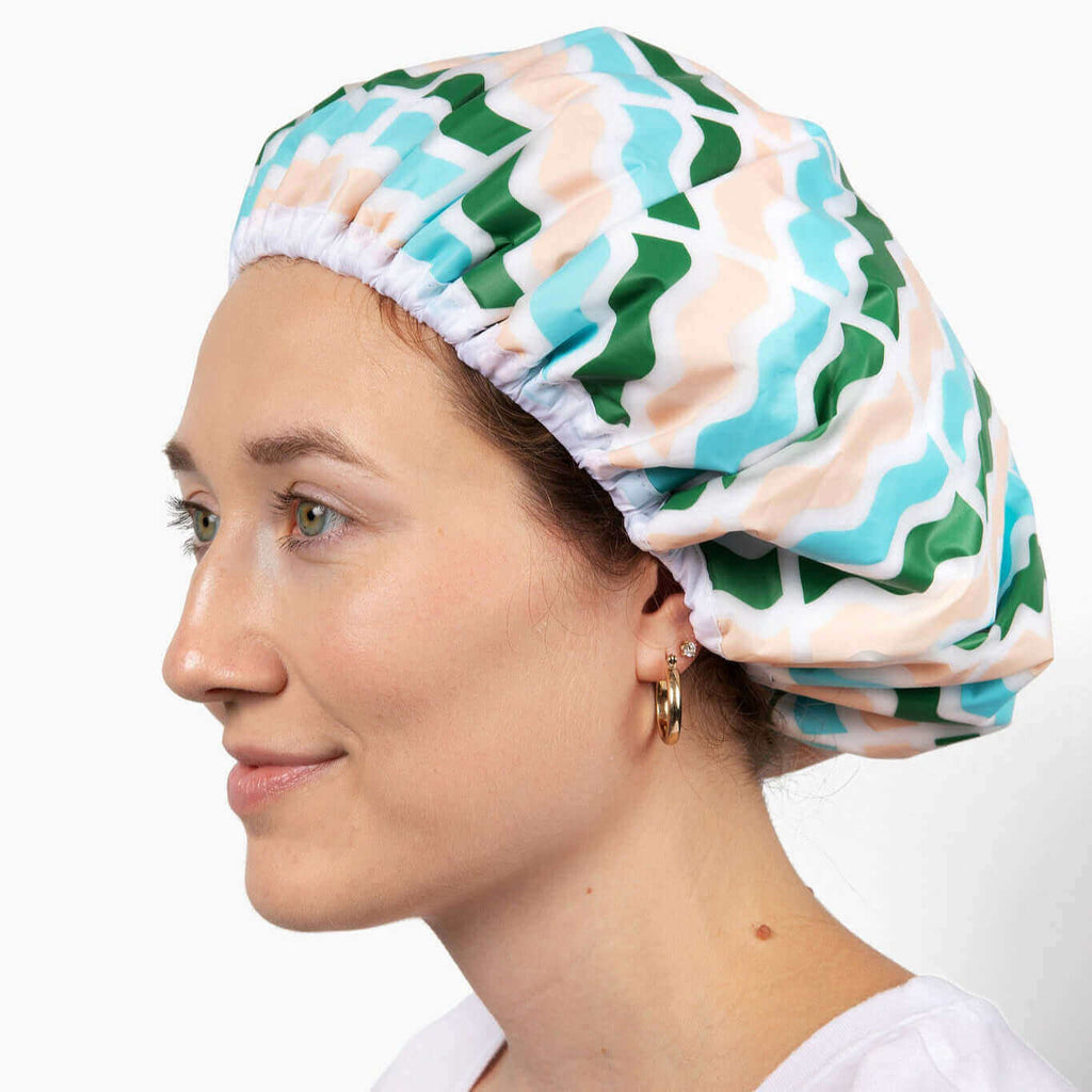 Profile of woman wearing SWAIR Shower Cap