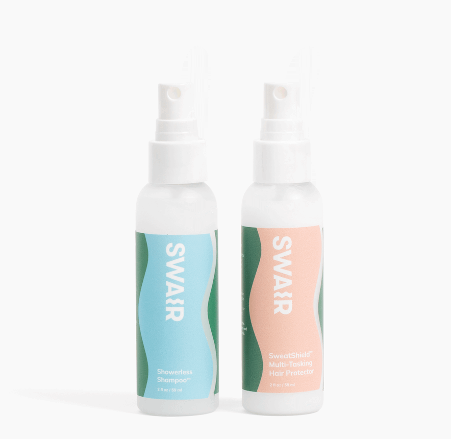 travel sized Showerless Shampoo bottle and travel sized SweatShield bottle on white background