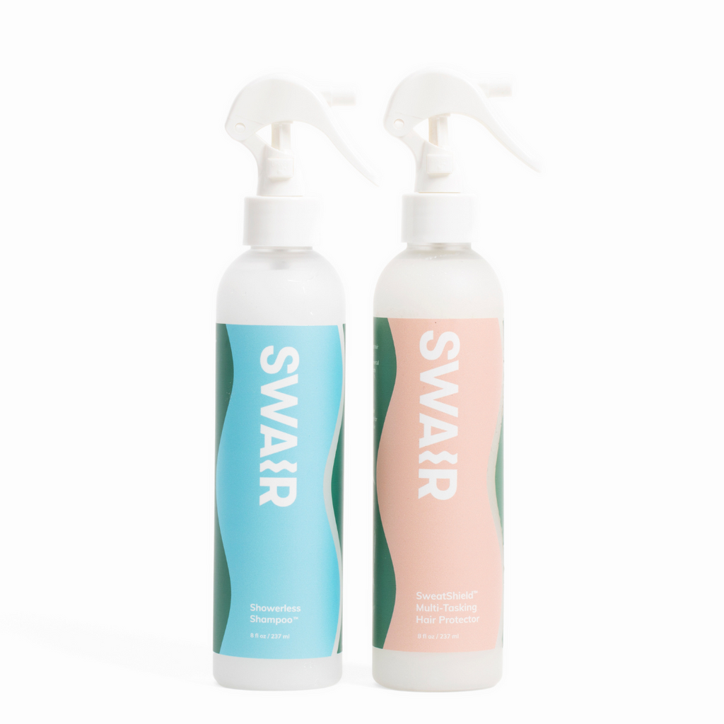 Showerless Shampoo bottle and SweatShield Leave-In Conditioner bottle on white background